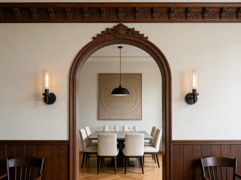 Dining room with Matte Black Rustic Industrial Wall Sconce Light With Tubular Clear Glass Lampshade on both sides of an archway