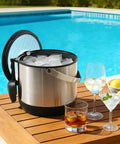 Insulated Ice Bucket For Parties With Scoop And Lid by the pool, holding ice for drinks, showcasing double wall design for easy transport.