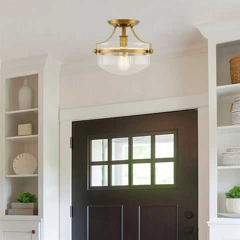 Zurich 12 Inch Rustic Semi Flush Mount Ceiling Light With Glass Shade And Oil Rubbed Bronze Finish Antique Brass Accents LED Compatible Easy Install Transitional Industrial Style For Living Room Hallway Or Kitchen installed above a doorway.