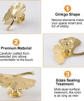 Six Piece Ginkgo Leaf Cabinet Knobs And Solid Zinc Drawer Pulls In Rustproof Brushed Gold Finish, detailed view of ginkgo design and sturdy base.
