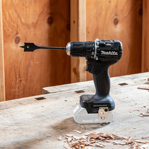 Subcompact Cordless Drill Driver With Brushless Power, 18V LXT, Half-Inch Chuck, Dual Speed in workshop with spade bit