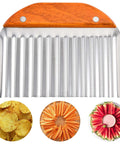 Front view of a large crinkle cutter with wooden handle and ridged stainless-steel blade for vegetables.