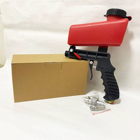 One Quarter Inch Air Sandblasting Gun Portable Handheld Sandblaster With 90 PSI Pneumatic Power next to cardboard box and fittings