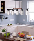 Straight Up Modern Farmhouse 5 Light Dining Room Chandelier With Dope Seeded Glass Shades Galvanized Steel Island Ceiling Fixture Lighting Top Shelf Kitchen Vibes over dining table.