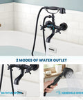 Close-up of oil rubbed bronze wall mount clawfoot bathtub faucet with handheld sprayer, showing 2 water outlets and swivel spout.