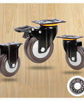 Premium Heavy Duty 125Mm Polyurethane Swivel Castor Wheels For Office Chair Industrial Trolley Furniture, three wheels on wooden surface.