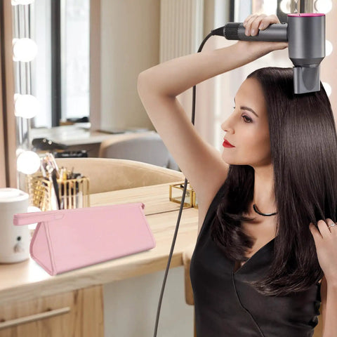 Woman using hairdryer with pink All In One Travel Case For Hair Gear Like Airwrap And Similar Dryers Waterproof Dustproof Shockproof Organizer