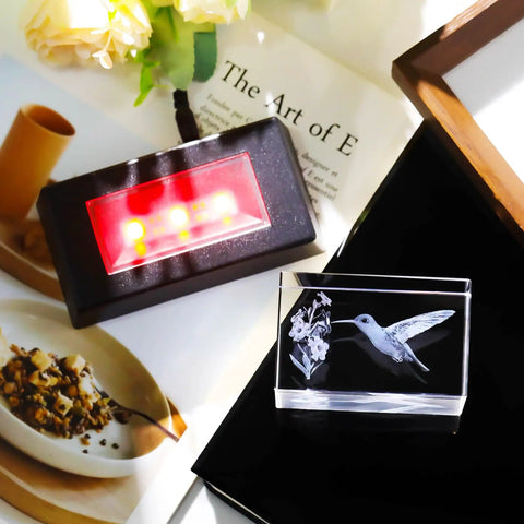 Crystal Hummingbird Laser Engraved 3D Figurine Gift For Her And Him with LED base on tabletop.