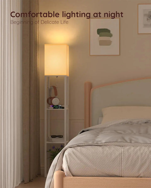 Solid Wood Shelf Floor Lamp With 2 Charging Ports And 1 Power Outlet in a bedroom corner, white finish, beech wood shelves.