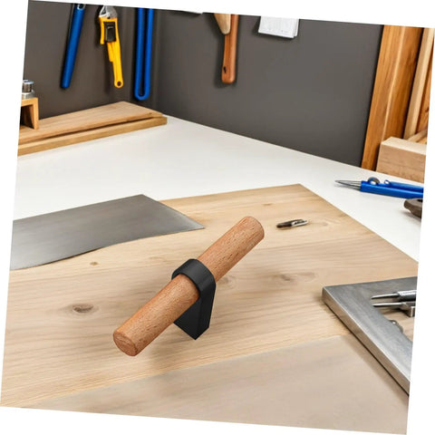 Solid Wood Cabinet Handle Black Drawer Pulls With Single Hole on wooden board in workshop setting