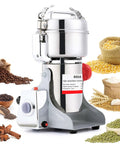 Heavy Duty 1800W Electric Grain Mill Grinder With 36000 Rpm High Speed Motor And 800g Stainless Steel Capacity, close-up view with herbs and grains.