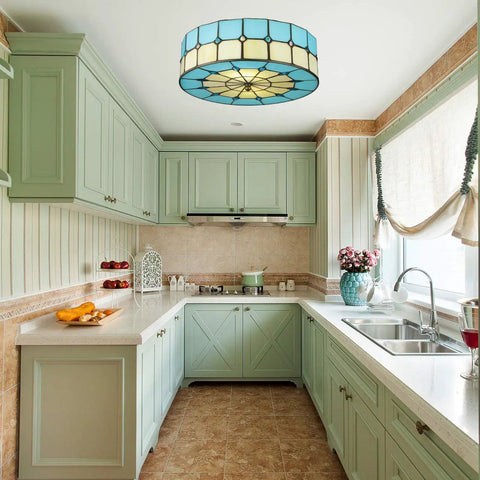 Vintage Tiffany Style Mermaid Glass Ceiling Light in blue finish, 11.8 inch, illuminating a cozy kitchen setting.