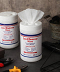 Lead Remover Wipes For Shooting 2 Pack 120 Wipes Hand And Surface Cleaning Wipes canisters on a workshop table.