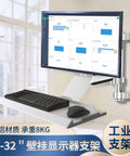Heavy Duty Adjustable Monitor Arm Rock Solid Aluminum Stand Ergonomic Single Screen Desk Mount Vesa Ready for workspace with keyboard and mouse.
