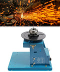 Heavy Duty Welding Positioner Turntable 22.05 Lbs 110V Portable Welder Positioner With Chuck And Foot Switch For Precise Clamping, Grinding, Cutting And Assembly Tasks In Any Shop. Blue metal welding turntable with chuck, 180mm table, and slanted base