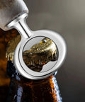 Close-up of silver metal bottle opener blank opening a beer bottle, part of the 15 pcs metal bottle opener blanks kit for wood craft DIY projects bulk inserts 1.5 by 3.25 inches silver finish for beer weddings parties and craft turning.