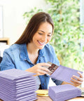 Woman using 100 Count Bubble Mailer Set Four Sizes Self Adhesive Waterproof Padded Envelopes For Shipping And Mailing Cushioning Seal