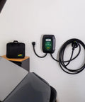 Level 2 Wall Mounted EV Charger With 40 Amp Fast Charging And 25 Foot Flexible Cable NEMA 14 50 Plug on wall with charging cable.