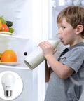 Child drinking milk near open fridge with Led Refrigerator Light Bulb 4 Watt Waterproof Freezer Light Bulbs A15 E26 Medium Base Appliance Fridge Light Bulb 40 Watt Equivalent 120V Daylight White Not Dim Pack Of 2 inset.