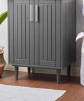 Augusta 24 Inch Gray Bathroom Vanity Cabinet With A Modern Vibe And Solid Construction Space Saving Design Tapered Legs Ample Storage Sink Basin Not Included showing tapered legs and soft-close doors.