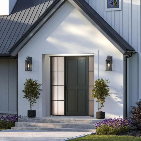Williamston Collection One Light Outdoor Wall Lantern In Antique Pewter Finish with clear glass on porch entrance