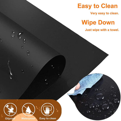 Close-up of Cuttable Silicone Stove Top Covers For Gas Burners 27x16.7 In, showing nonstick surface with water droplets