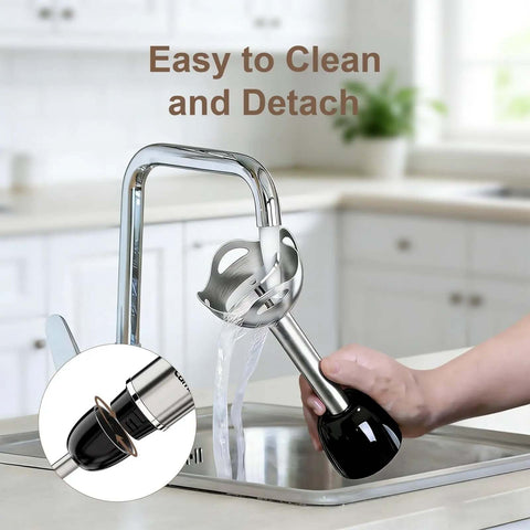 Cordless Hand Blender That Hits Different With Six Speed Settings And Four Versatile Attachments Including Chopper Whisk And Frother For Effortless Meal Prep being rinsed under the faucet in a kitchen sink.