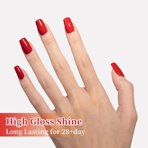 Hand with red nails using Dope Big Apple Red Gel Polish Salon Grade 0.5 Fl Oz Soak Off UV LED Cure For 60 To 90 Seconds Safe Low Odor HEMA Free And TPO Free Nail Lacquer