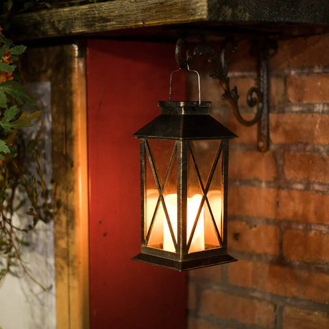 Outdoor Hanging Solar Lanterns Waterproof LED Lights For Porch Garden Patio Pathway Deck Yard Bronze Finish Two Pack No Fuss Auto On At Night With Upgraded Solar Panel And 600mAh NiMH Battery. Bronze lantern hanging on brick wall.