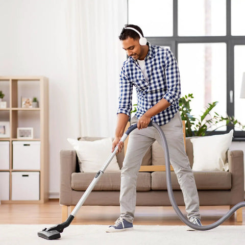 Person using vacuum with 8 Pack Style C And Q Canister Vacuum Bags Replacement For Kenmore 50104 5055 50557 50558 Type C 5