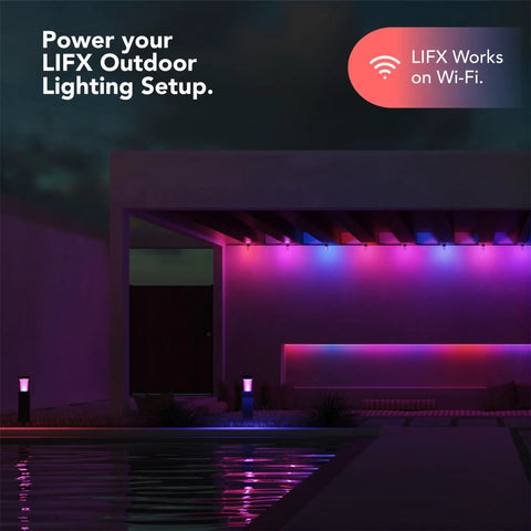 Outdoor lighting setup by pool with multicolored lights highlighting the facade, illustrating LIFX Wi-Fi capability