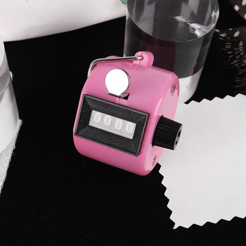 Dang Solid Four Digit Mechanical Tally Clicker Counter In Bright Pink with metal ring and lanyard for tracking sports and crafts.