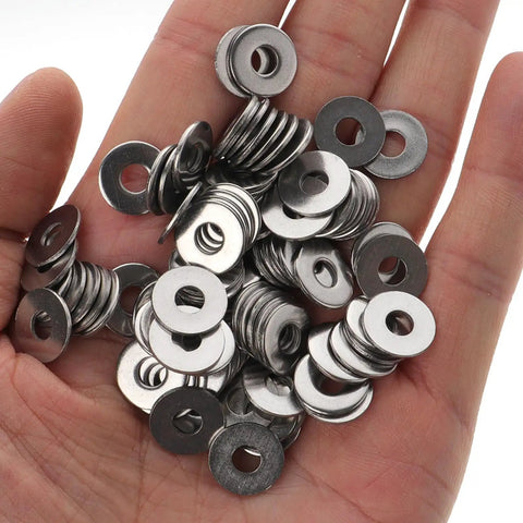 Ten Piece Carriage Bolt And Nut Hardware Kit With 304 Stainless Steel Washers for Equipment and Carriages in a hand close-up