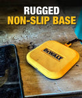 Yellow rugged non-slip wireless charger pad with Dewalt logo on a wooden surface, includes Type-C cable for Qi charging.