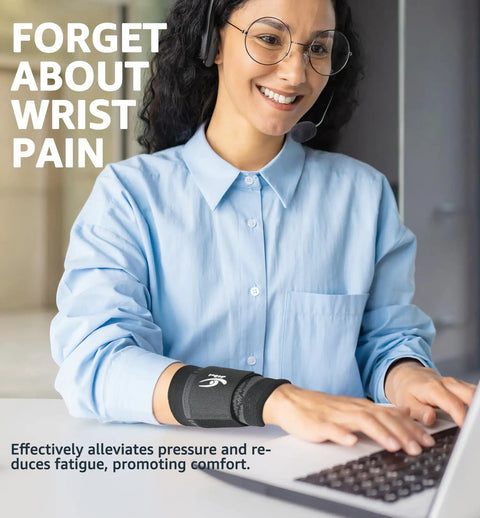 Woman typing while wearing a Wrist Brace And Support Wraps For Workouts And Daily Use Comfortable Compression Strap for pain relief.