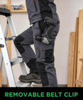 Badass 20V Brushless Cordless Drill Driver Set With 443 Inch Pounds Torque Two Speed Gears And 20 Ah Battery on a workman's belt while climbing a ladder.