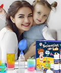Hands On Science Lab Kit For Kids With 72 Plus Experiments Including Erupting Volcano Rainbow Rain And Artificial Snow Balloon Rocket And More Kid Friendly STEM Toy For Boys And Girls with a smiling woman and child using the kit.