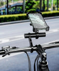 Heavy Duty Aluminum Bike Handlebar Extender Mount for GPS Speedometer and LED Light on a road bike with mounted phone