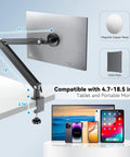 Magnetic Portable Monitor Arm With 360 Degree Swivel Heavy Duty Aluminum Desk Clamp holding monitor, compatible with tablets.