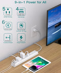 Two Pack Heavy Duty Surge Protector Power Strip With Six Foot Extension Cord, mounted on desk, powering devices, white finish, 5 outlets, 4 USB ports.