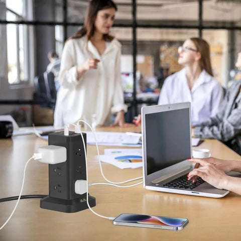 Office desk with Beefy Power Strip Tower with USB Ports and Surge Protector 12 Outlets 10 Ft Extension Cord connected to laptop and phone