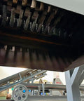 Heavy Duty Dual Shaft Tire Shredder Machine For Fleet Trucks And Standard Cars Ultimate Rubber Recycling Grinder interior view showing sharp blades.