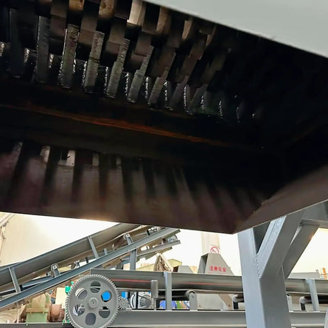 Heavy Duty Dual Shaft Tire Shredder Machine For Fleet Trucks And Standard Cars Ultimate Rubber Recycling Grinder interior view showing sharp blades.