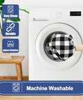 Hand placing buffalo plaid table cloth in washing machine; Waterproof Elastic Fitted 6Ft Picnic Table Cloth 2 Pack Buffalo Plaid Black White