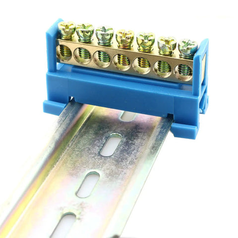 Seven Position Terminal Block Bus Bar With Brass Screw Terminals For DIN Rail Grounding Strip Easy Snap In Mount Fifty Millimeter Long Six Millimeter Holes M5 Screws Copper Bar Height Nine Millimeter Bottom Mount Cold Pressed Copper installed on rail.