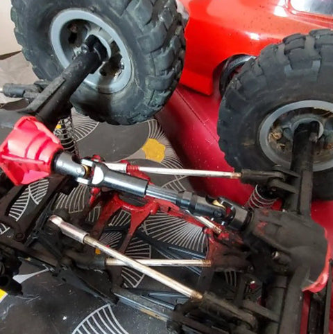 Two Pack Internal Spline RC Driveshaft 121-190mm installed on 1/10 scale crawler chassis, showcasing steel universal joint upgrade
