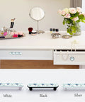 Blue Starfish Cabinet Pulls 4 Pack Center To Center Three Quarter Inch Silver Nautical Drawer Handles installed on white furniture.