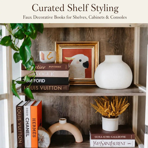 Curated shelf with Luxe Large Faux Decorative Books Set 4 Pieces as props for modern coffee table decor and home staging.
