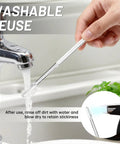 Hand rinsing Sticky Ear Wax Remover Sticks For Gentle Cleanout Reusable Ear Picks Kit next to faucet