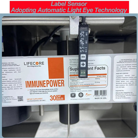 Label sensor detail for Smooth Operator Semi Automatic Round Bottle Labeler delivering rock solid precision at 10 to 30 labels per minute.